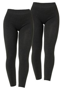 Leggings neri con vita alta, realizzati in un tessuto elasticizzato testurizzato. Progettati per aderire lungo le gambe, offrendo una silhouette liscia.