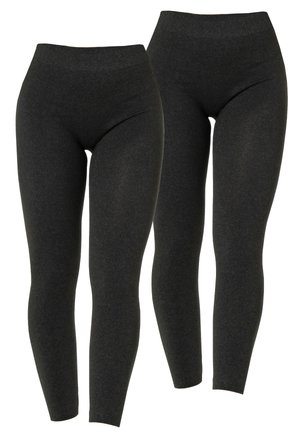 Leggings neri con vita alta, realizzati in un tessuto elasticizzato testurizzato. Progettati per aderire lungo le gambe, offrendo una silhouette liscia.