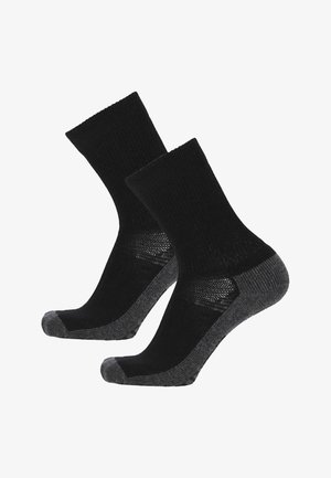 Calzini neri a girocollo con punta e tallone rinforzati in grigio, polsini a coste e ventilazione a rete sull'arco plantare.