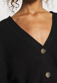 Monki Chaqueta de punto - black