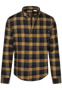 Geruit flanellen shirt in marineblauw, geel en bruin. Knopen met een kraag en een enkele borstzak. Zachte textuur met een normale pasvorm.