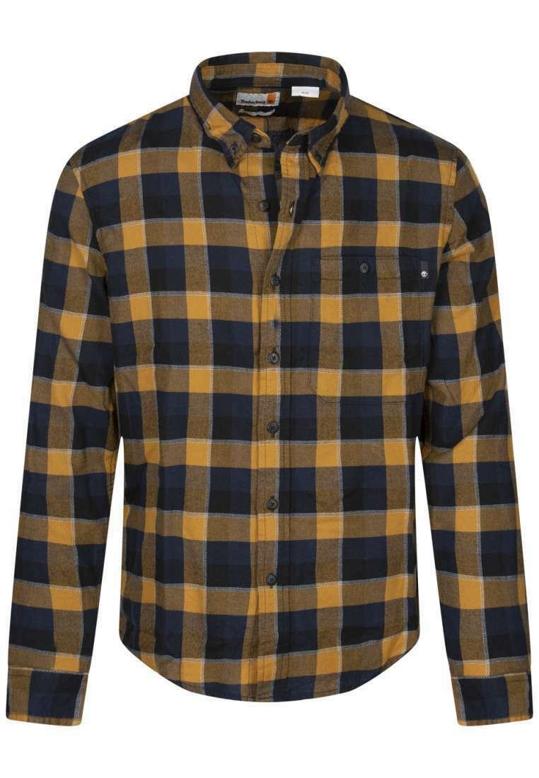 Geruit flanellen shirt in marineblauw, geel en bruin. Knopen met een kraag en een enkele borstzak. Zachte textuur met een normale pasvorm.