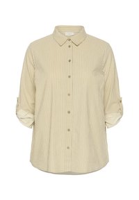 Chemise à rayures verticales beige et blanche, boutonnée, avec col et manches retroussées maintenues par des pattes à boutons.