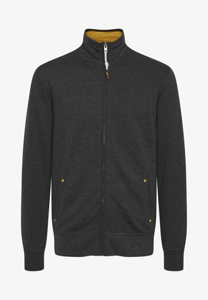 Tamsiai pilkas užtrauktuku užsegamas džemperis su aukštu apykakle, geltonu vidiniu pamušalu ir dviem šoninėmis kišenėmis su geltonais akcentais. Minkšta, tekstūruota medžiaga.