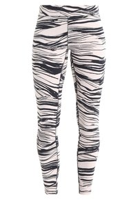 Tajta leggings i ett mönster av rosa och svarta zebraränder. Har en mjuk textur och ett elastiskt midjeband för komfort och flexibilitet.