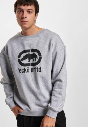Gray cotton sweatshirt featuring a large black graphic of a rhino and the text "*eckō unltd." on the front. Relaxed fit with ribbed cuffs.