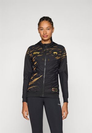 Venum UFC FUSION AUTHENTIC FIGHT NIGHT WOMENS WALKOUT HOODIE CHAMPION - Sportinė striukė - black/gold