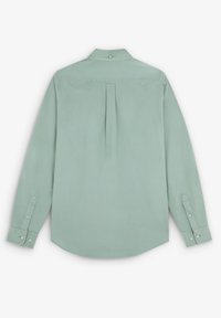 Een mintgroen overhemd met lange mouwen en een button-down kraag, voorzien van een plooitje aan de achterkant en knopenmanchetten. Zachte, gladde textuur,tailored fit.