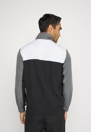 WOVEN SUIT - Verryttelypuku - black