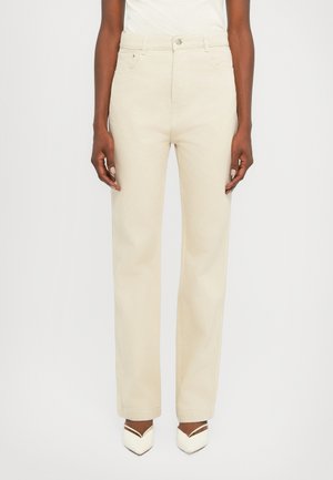 Beige wide-leg trousers made of denim, featuring a front button closure, five pockets, and visible stitching along the seams.