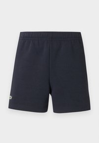 Shorts bleu marine en tissu texturé avec une taille élastique et un petit logo brodé sur le côté gauche.