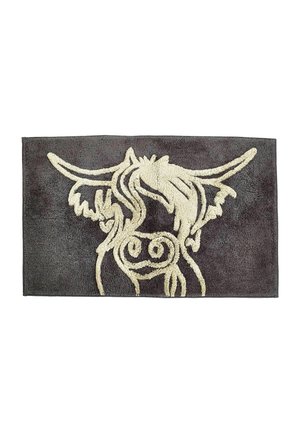 Dark gray rectangular rug with an outlined white Highland cow face featuring long horns and shaggy hair in the center.