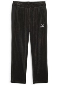 Pantalones de chándal de velour negros con cintura elástica, bolsillos laterales y un logo de Puma blanco en el lado izquierdo. Textura suave y corte relajado.