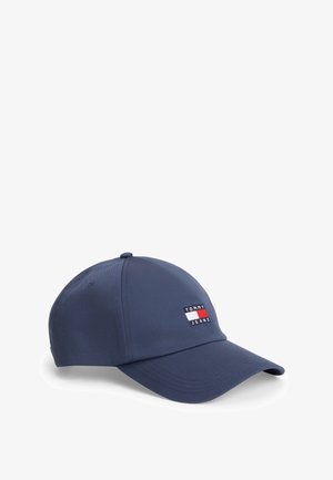 Marineblauwe baseballpet met gebogen klep en klein rechthoekig Tommy Jeans-logo in rood, wit en zwart op het voorpaneel.