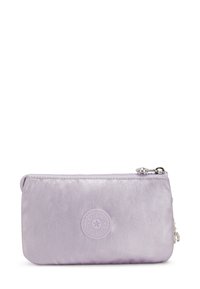 Lilac zippered pouch made of smooth nylon, featuring a round logo patch and silver hardware. Compact, rectangular design with subtle sheen.