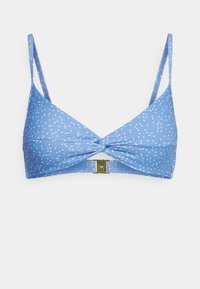 Top de bikini azul com bolinhas brancas, design frontal torcido, alças finas ajustáveis e fecho de clasp em tom dourado. Textura de tecido lisa.