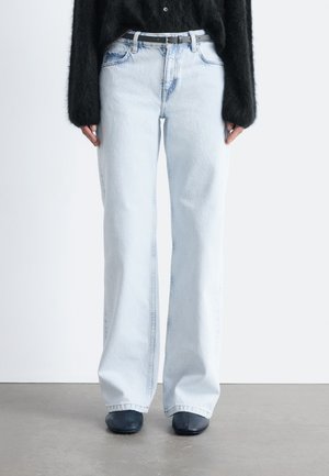 Light blue wide-leg jeans made of denim, featuring a high waist, classic five-pocket design, and subtle fading details.