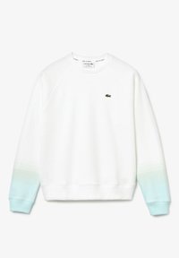 Felpa bianca con maniche raglan, caratterizzata da un orlo gradiente blu-verde. Include un piccolo logo verde sul petto. Realizzata in tessuto morbido.