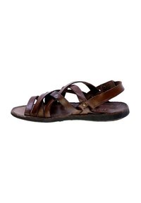 Sandal in pelle marrone con più strap incrociati, una fascia posteriore e una suola piatta con un interno texturizzato.
