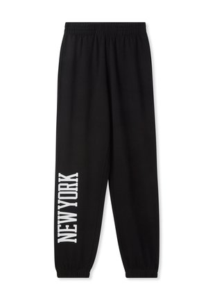 Pantaloni tuta neri con vita elastica, caratterizzati da una stampa bianca audace "NEW YORK" in verticale sulla gamba sinistra. Tessuto morbido.