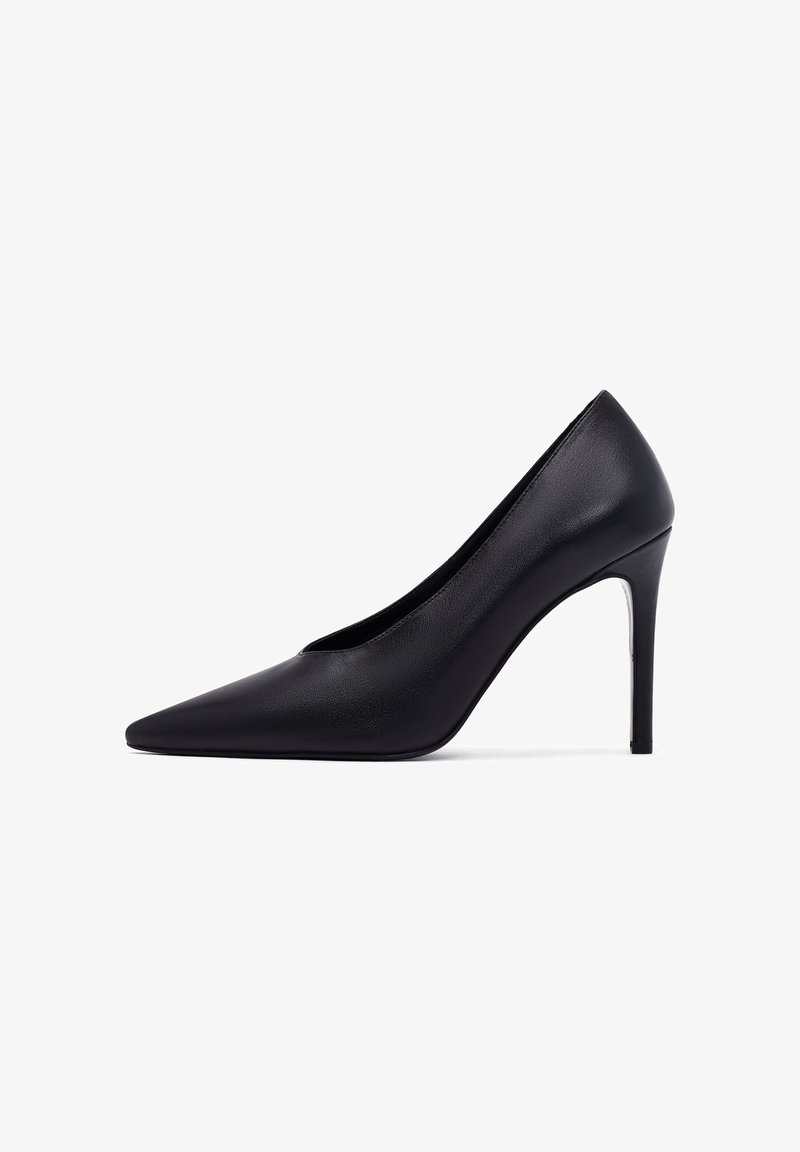 Black leather pointed-toe pump with a sleek silhouette and a high stiletto heel, featuring a smooth texture and clean design.