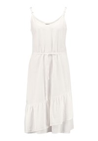 Vit ärmlös klänning med rundad halsringning, figurnära midja och knytdetalj. Har en lager-på-lager volangkant och ett mjukt, lätt tyg.