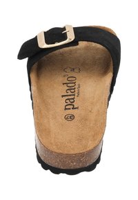 Svart mocka slip-on sandal med justerbar silverfärgad spänne, korkfotbädd och konturerad ljusbrun innersula märkt "palado".