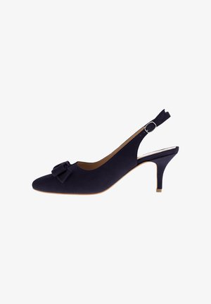 Navy suede slingback heel with a pointed toe, decorative bow on the vamp, and a slender heel. Features a buckle adjustment on the strap.