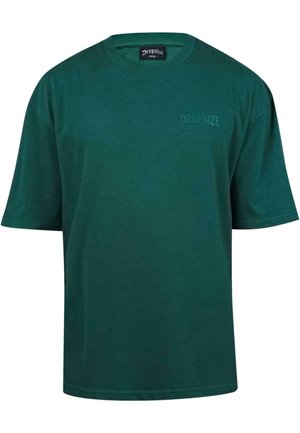 Grüne Baumwoll-T-Shirt mit Rundhalsausschnitt, kurzen Ärmeln und einem dezenten DROP-SIZE-Logo auf der Brust. Standard Passform, glatte Textur.
