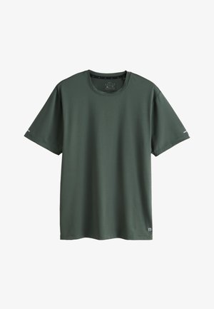 T-shirt de sport vert foncé à manches courtes et col rond, avec une texture subtile et de petits détails réfléchissants sur les manches et l’ourlet.