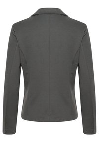 Šedý blazer s klopovým límcem, dlouhými rukávy a přiléhavým střihem. Hladký povrch a jemný lesk, vyznačuje se čistými stehy.