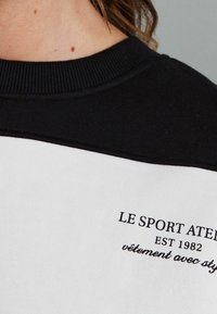 Next Felpa - black