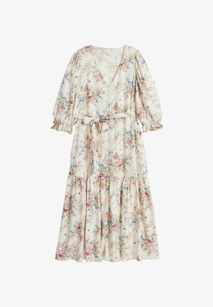 Blommig maxiklänning i cremefärgad tyg med puffärmar, djup V-ringning och knytmidja. Har en lager-på-lager kjol med rosa och blå blommönster.