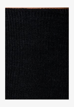 Tessuto a coste nero con una superficie testurizzata, che presenta linee verticali e un materiale morbido e stretch. Adatto per varie applicazioni nella moda.