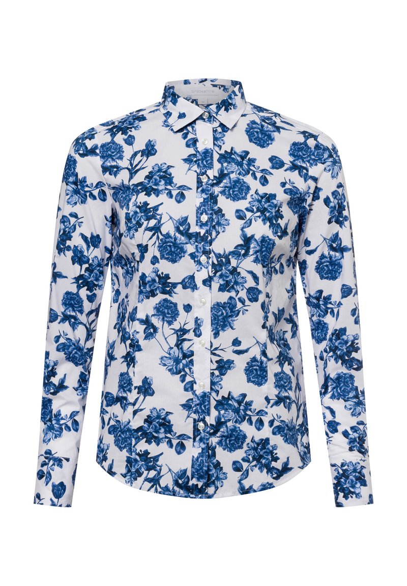 Koszula z długim rękawem, zapinana na guziki, na białym tle, z niebieskimi wzorami kwiatowymi, z kołnierzykiem z zaostrzonym końcem oraz zaokrąglonym dołem.