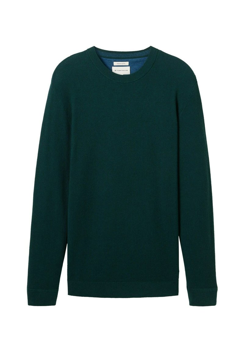 Dunkelgrüner gestrickter Pullover mit langen Ärmeln, Rundhalsausschnitt, rippendem Muster und geradem Saum. Etikett im Kragenbereich sichtbar.
