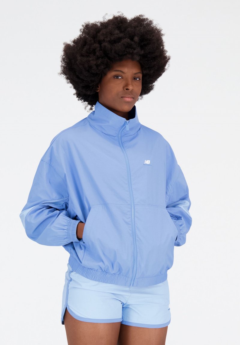 New Balance ATHLETICS JACKET Summer jacket blue Zalando.co.uk