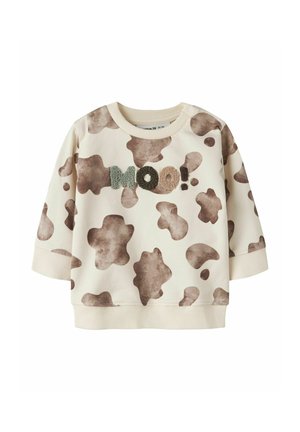 Baby-sweatshirt med creme- og brun ko-print, teksturerede bogstaver, der staver "MOO!" hen over brystet, samt ribstrikkede manchetter og kant.