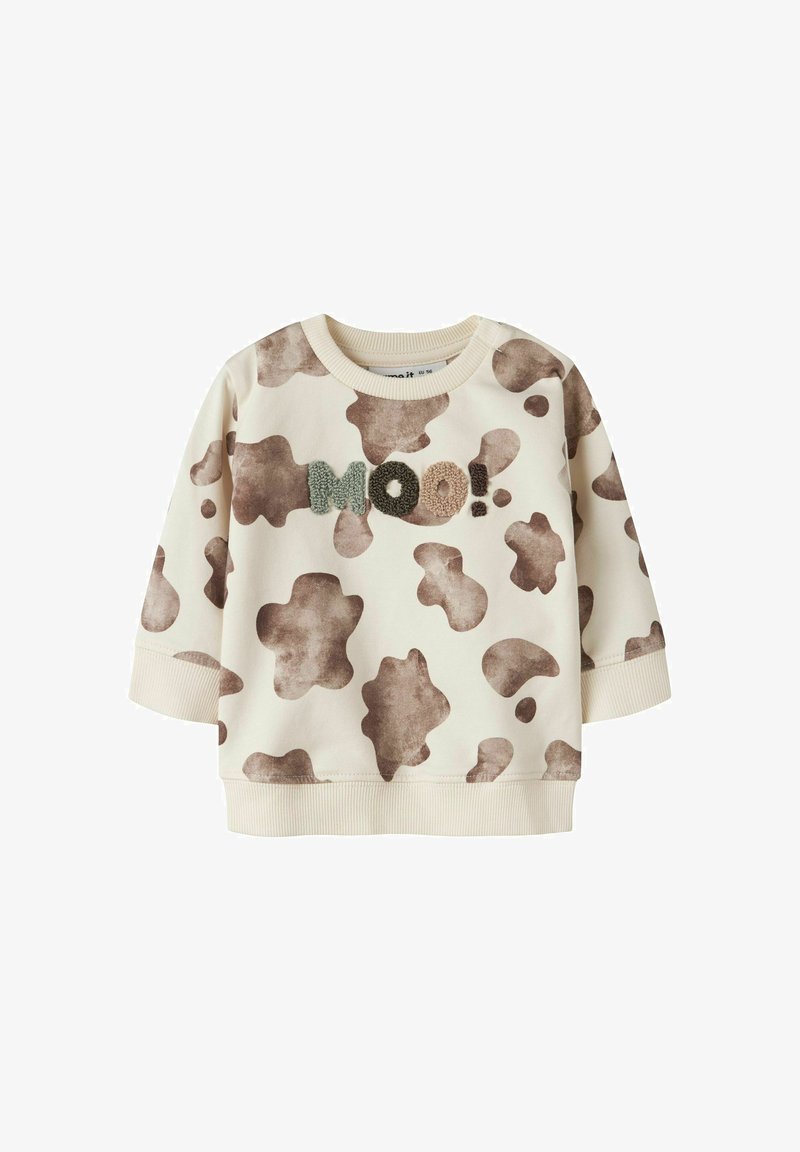 Sweat pour tout-petit imprimé vache crème et marron avec lettres texturées formant "MOO!" sur la poitrine, manches et bas côtelés.