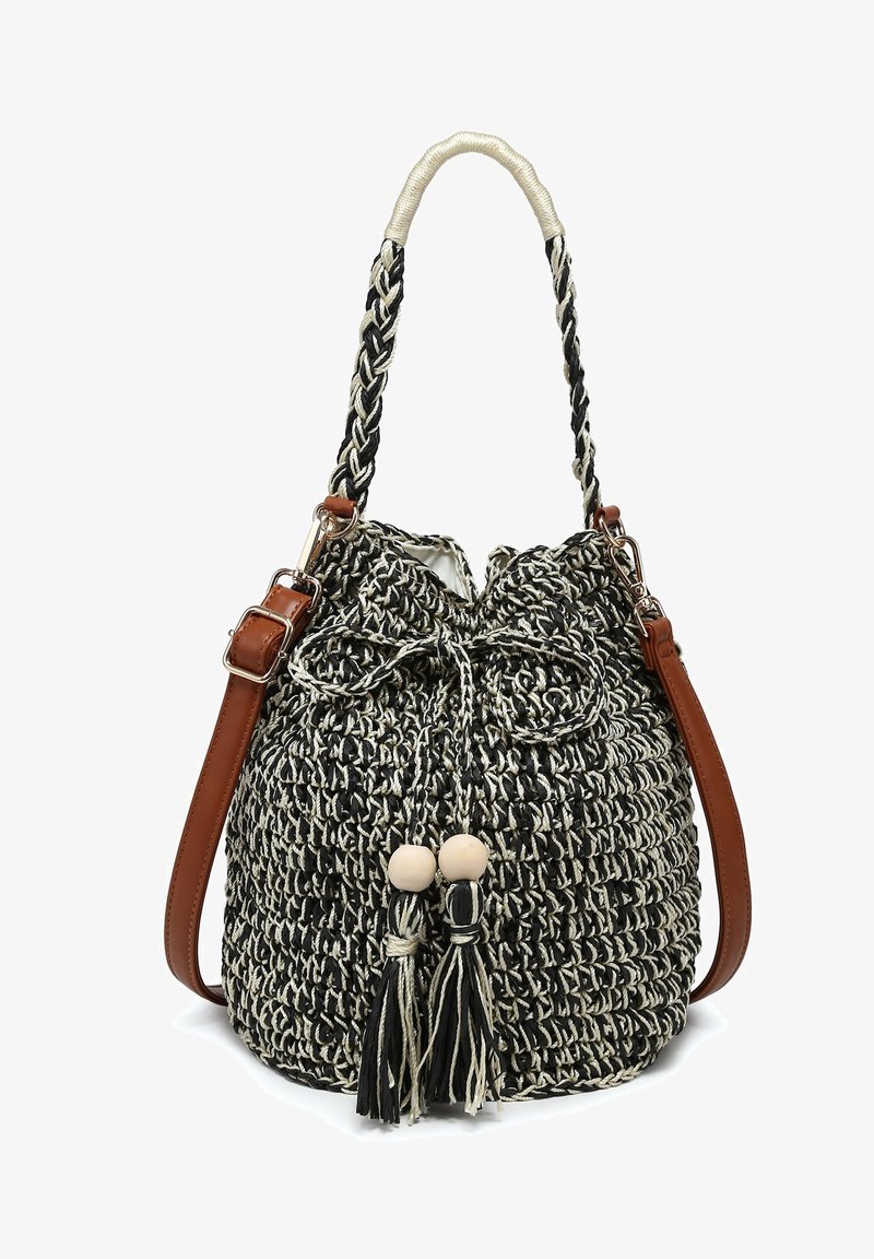 Sac seau tissé noir et blanc avec poignée tressée, bandoulière réglable marron, fermeture à cordon et pompons avec perles en bois.