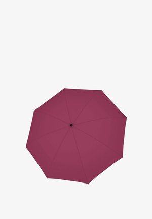 Closed red umbrella with black central hub viewed from above on a white background.