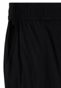 Pantalon noir avec taille élastique, poche latérale et surpiqûres apparentes le long de la poche et de la taille.