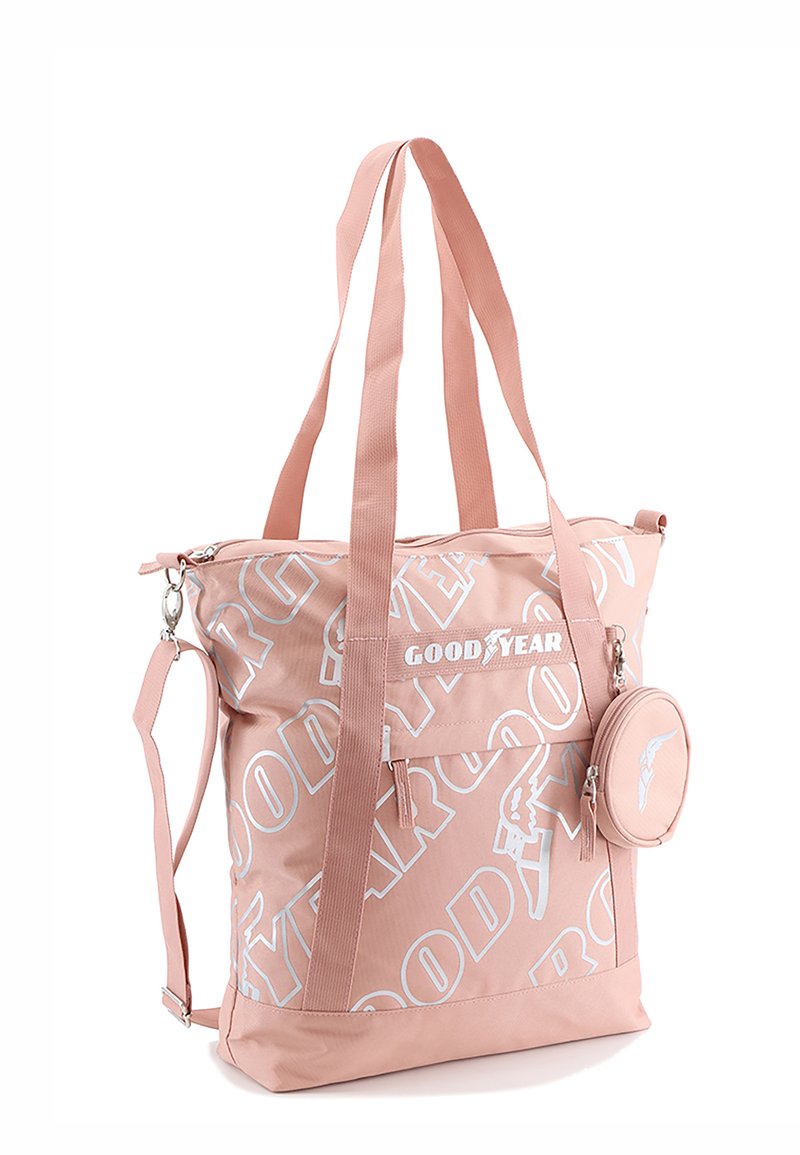 Pink nylon tote bag with white "GOODYEAR" logo and patterns. Features two handles, adjustable shoulder strap, and a small detachable pouch.