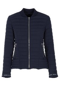 Navy blue quilted jacket with a zippered front, ribbed collar, two side pockets, and elastic cuffs featuring logo accents.
