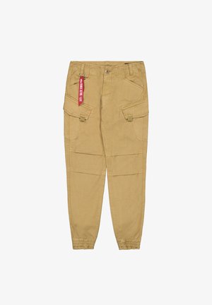Beige Cargohosen aus Baumwolle mit seitlichen Taschen, elastischen Bündchen und einem roten Etikett am Bund.
