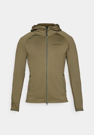 Olijfgroene hoodiejas van zacht, rekbaar materiaal met een volledige rits aan de voorkant en een subtiel logo op de borst. Heeft een gestroomlijnd ontwerp.