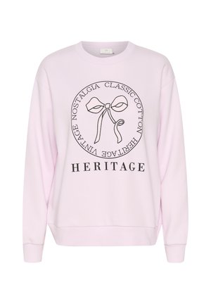 Světle růžová bavlněná mikina, s centrálním grafickým prvkem se mašlí a textem "HERITAGE" pod ním. Jednoduchý design s uvolněným střihem.