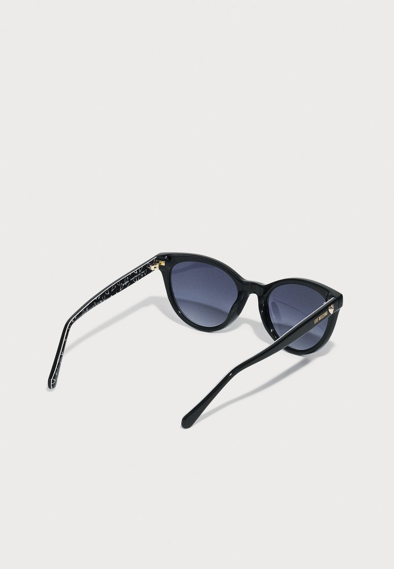 Love Moschino Black Cat-Eye Sunglasses with Dark Lenses Love Moschino MOL105/S Cat Eye Sunglasses | Fashion Eyewear UK main image 2
