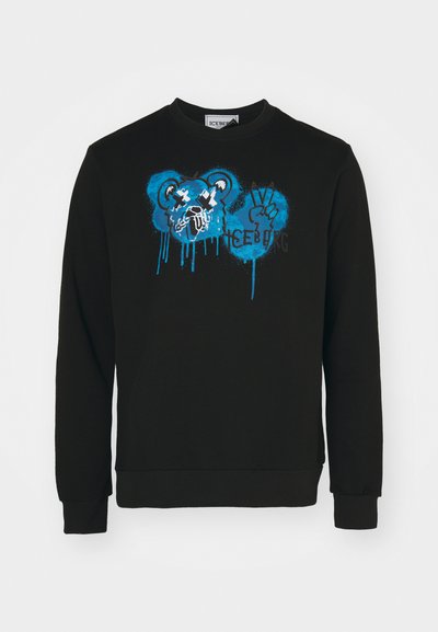 Sweatshirt noir avec un col rond. Présente un graphique de ours bleu et un texte "ICEBERG" de style graffiti sur le devant, avec une texture lisse.