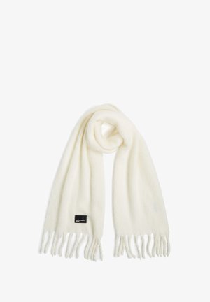 Fehér gyapjú sál rojtos végekkel, puha tapintású, és egy kis fekete márkacímke a szélén. Hossza körülbelül 70 inch.